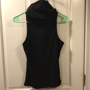 Sleeveless black turtle neck